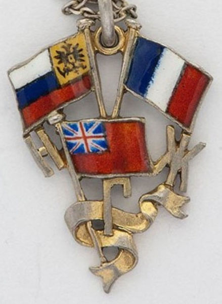 Файл:Жетон Нарвской женской гимназии.jpg